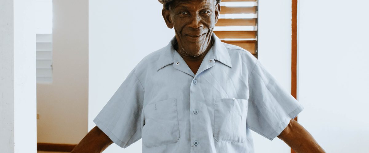 older adult male smiling